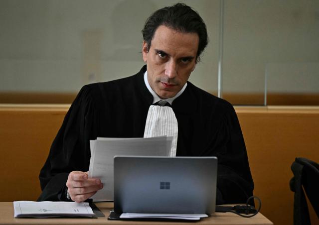 Lawyer Philippe Ohayon representing Félix Bingui, the alleged leader of the Yoda gang on drug trafficking charges looks on ahead of Bingui's trial at The Marseille Courthouse in Marseille, southern France on May 18, 2025. Described as the "undisputed leader" of the Yoda clan, which was defeated following a bloody war against the DZ Mafia in 2023, Félix Bingui, a prominent figure in Marseilles drug-related criminal underworld, is appearing in court on May 18, 2026 for a three-week trial alongside 19 co-defendants, all of whom are alleged members of his network. (Photo by Gabriel BOUYS / AFP)