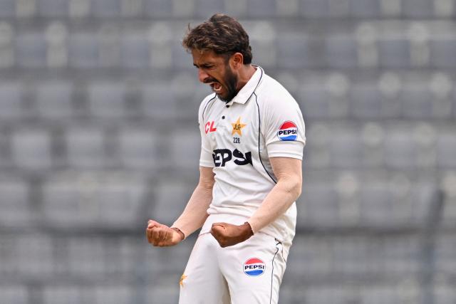 Pakistan's Hasan Ali celebrates after taking the wicket of Bangladesh's Litton Das during the third day of the second Test cricket match between Bangladesh and Pakistan at the Sylhet International Cricket Stadium in Sylhet on May 18, 2026. (Photo by Munir UZ ZAMAN / AFP)