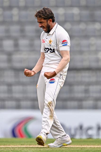 Pakistan's Hasan Ali celebrates after taking the wicket of Bangladesh's Litton Das during the third day of the second Test cricket match between Bangladesh and Pakistan at the Sylhet International Cricket Stadium in Sylhet on May 18, 2026. (Photo by Munir UZ ZAMAN / AFP)