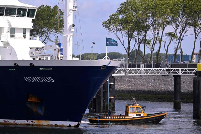 The Dutch Hantavirus-hit cruise ship MV Hondius dock at the port of Rotterdam on May 18, 2026. Cruise ship MV Hondius arrived at the port of Rotterdam and the ship's crew members will undergo a medical screening. (Photo by JOHN THYS / AFP)