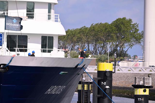 The Dutch Hantavirus-hit cruise ship MV Hondius arrives at the port of Rotterdam on May 18, 2026. Cruise ship MV Hondius arrived at the port of Rotterdam and the ship's crew members will undergo a medical screening. (Photo by JOHN THYS / AFP)