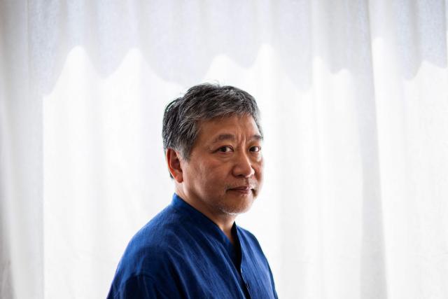 Japanese director and screenwriter Hirokazu Kore-eda poses for a portrait session on the sidelines of the 79th edition of the Cannes Film Festival in Cannes, southern France, on May 17, 2026. Hirokazu Kore-eda, a leading figure in Japanese cinema and winner of the 2018 Palme d’Or, said on May 17, 2026 in Cannes – where his new film "Sheep in the Box" is in competition – that he would fight “to the very end” to ensure that a human being is involved “at every stage of film production”. (Photo by Julie SEBADELHA / AFP)