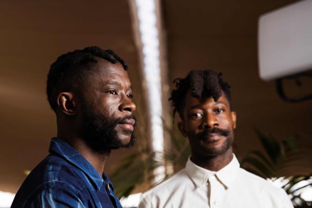 Nigerian director and screenwriter Arie Esiri (L) and Nigerian director Chuko Esiri pose for a portrait session on the sidelines of the 79th edition of the Cannes Film Festival in Cannes, southern France, on May 17, 2026. The Lagos of Arie and Chuko Esiri's Cannes Film Festival hit "Clarissa" is not one that has ever been seen on the big screen. The lives, loves, petty snobberies and private torments of some of Nigeria's most privileged people would not seem the stuff to solicit much sympathy in a megacity where the rich float over so much human misery. (Photo by Julie SEBADELHA / AFP)