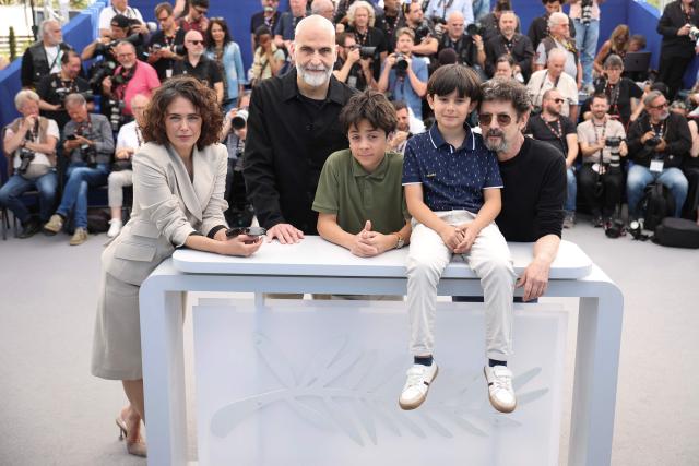 (From L) Spanish actress Patricia Lopez Arnaiz, Portuguese director and screenwriter Tiago Guedes, Spanish actor Alex Pelaez, Spanish actor Hugo Encuentra and Spanish actor Manolo Solo pose during a photocall of the film "Aqui" at the 79th edition of the Cannes Film Festival in Cannes, southern France on May 18, 2026. (Photo by Valery HACHE / AFP)