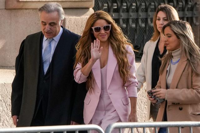 (FILES) Colombian singer Shakira (2nd-L) arrives with her lawyer Pau Molins (L) at the High Court of Justice of Catalonia for her trial on tax fraud, in Barcelona on November 20, 2023. Spanish courts have ordered the tax authorities to reimburse singer Shakira more than 55 million euros that were unduly collected, cancelling a tax dispute for the year 2011, according to a court document consulted by AFP on Monday. (Photo by Pau BARRENA / AFP)