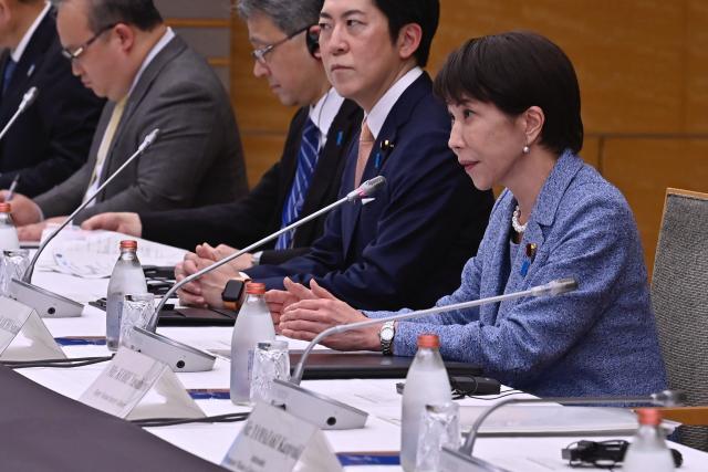 Japan's Prime Minister Sanae Takaichi (R) attends a meeting with United Nations Secretary-General Antonio Guterres (not pictured) at the Prime Minister's Office in Tokyo on May 18, 2026. (Photo by David Mareuil / POOL / AFP)