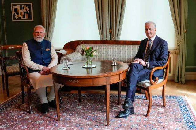 India's Prime Minister Narendra Modi (L) and Norway's Prime Minister Jonas Gahr Store are pictured during their meeting at the Norwegian government's representative facility in Olso, Norway, on May 18, 2026. India's Prime Minister Narendra Modi is on five-nation tour and will attend the third Nordic-Indian Summit on May 18 and 19, 2026. (Photo by Fredrik Varfjell / NTB / AFP) / Norway OUT