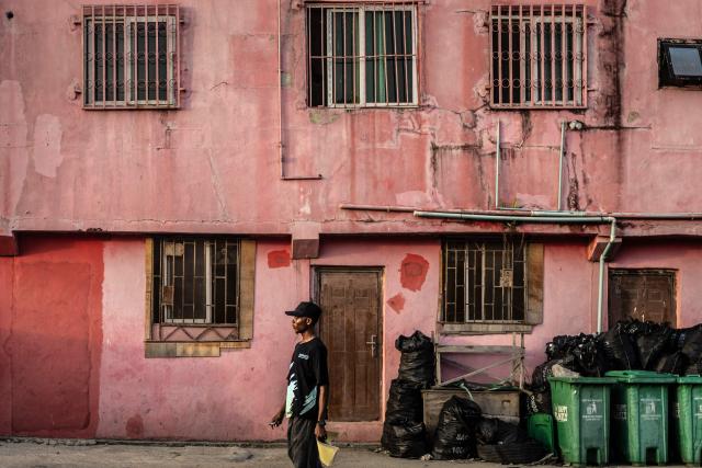 TOPSHOT - A visitor walks inside China Town in the Ojota neighbourhood of Lagos on May 4, 2026. (Photo by OLYMPIA DE MAISMONT / AFP)