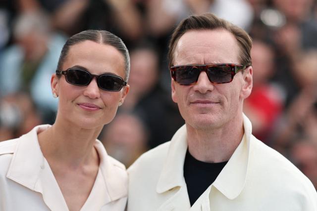 Swedish actress Alicia Vikander and German actor Michael Fassbender pose during a photocall of the film "Hope" at the 79th edition of the Cannes Film Festival in Cannes, southern France on May 18, 2026. (Photo by Thibaud MORITZ / AFP)