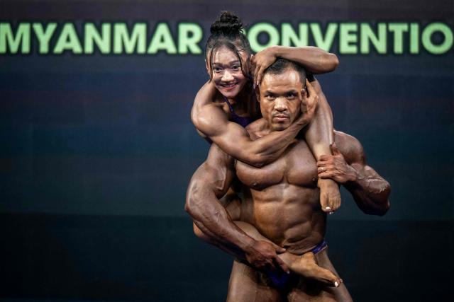 Bodybuilders compete in the 20th South East Asian Championships 2026 at the Myanmar Convention Centre in Yangon on May 17, 2026. (Photo by Sai Aung MAIN / AFP)