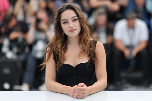 French actress Luana Bajrami poses during a photocall of the film "La Troisieme Nuit" (When the Night Falls) at the 79th edition of the Cannes Film Festival in Cannes, southern France on May 18, 2026. (Photo by Thibaud MORITZ / AFP)