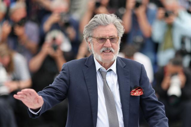 French director Daniel Auteuil poses during a photocall of the film "La Troisieme Nuit" (When the Night Falls) at the 79th edition of the Cannes Film Festival in Cannes, southern France on May 18, 2026. (Photo by Thibaud MORITZ / AFP)