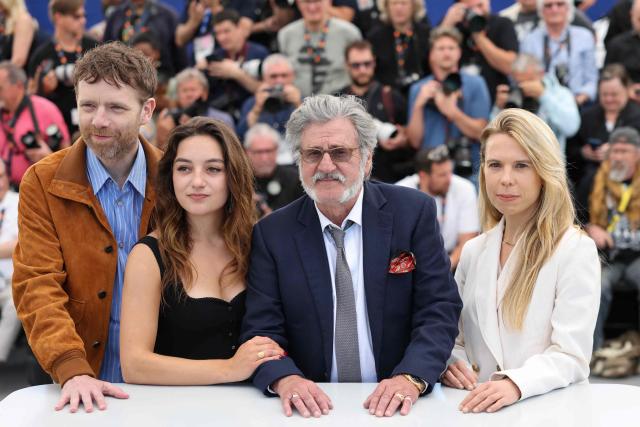 (From L) French actor Antoine Reinartz, French actress Luana Bajrami, French director Daniel Auteuil and French screenwriter Camille Lugan pose during a photocall of the film "La Troisieme Nuit" (When the Night Falls) at the 79th edition of the Cannes Film Festival in Cannes, southern France on May 18, 2026. (Photo by Thibaud MORITZ / AFP)