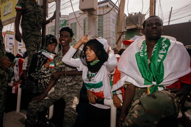 A Somalilander reacts as they celebrate the 35th Independence day celebrations near the presidential palace in Hargeisa's Shap neighbourhood on May 18, 2026. (Photo by Kang-Chun Cheng / AFP)