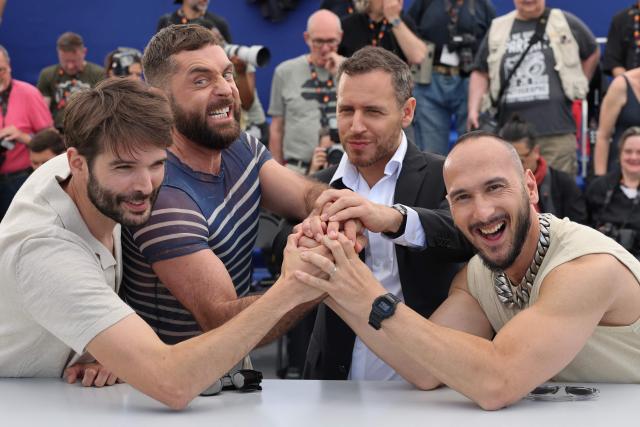 (From L) French director and screenwriter Nicolas Athane, French screenwriter Simon Balteaux, French screenwriter Brice Chevillard, French director and screenwriter Marco Nguyen pose during a photocall of the film "Jim Queen" at the 79th edition of the Cannes Film Festival in Cannes, southern France on May 18, 2026. (Photo by Thibaud MORITZ / AFP)