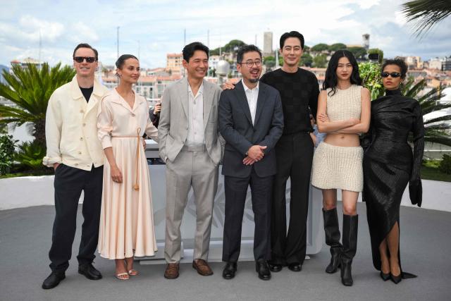 (From L) German actor Michael Fassbender, Swedish actress Alicia Vikander, South korean actor Hwang Jung-Min, South Korean director and screenwriter Na Hong-Jin, South Korean actor Zo In-Sung, South Korean actress Ho-yeon Jung and Canadian actress Taylor Russell  pose during a photocall of the film "Hope" at the 79th edition of the Cannes Film Festival in Cannes, southern France on May 18, 2026. (Photo by Olivier CHASSIGNOLE / AFP)