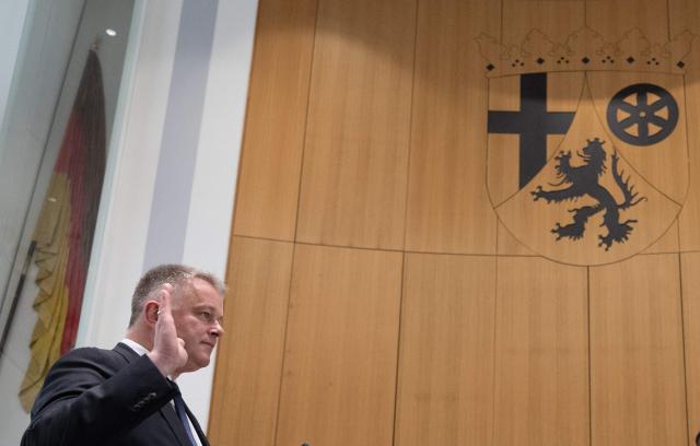 The new State Premier of Rhineland-Pfalz, member of the conservative Christian Democratic Union (CDU) party Gordon Schnieder is sworn in by the President of the State Parliament on May 18, 2026 in Mainz, western Germany. The Constituent session of the new state parliament with the election of the Minister-President of Rhineland-Palatinate follows the state elections of March 22, 2026. (Photo by Boris Roessler / POOL / AFP)