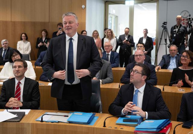 The new State Premier of Rhineland-Palatinate, member of the conservative Christian Democratic Union (CDU) party Gordon Schnieder is acknowledged by members of the Rhineland-Palatinate state parliament during its constituent session in Mainz, western Germany, on May 18, 2026. The Constituent session of the new state parliament with the election of the Minister-President of Rhineland-Palatinate follows the state elections of March 22, 2026. (Photo by Boris Roessler / POOL / AFP)