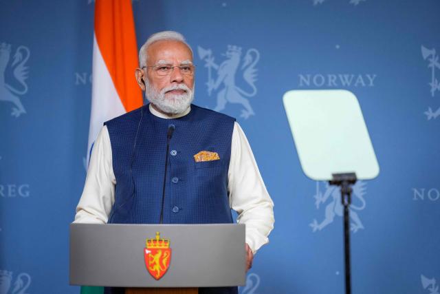 India's Prime Minister Narendra Modi and Norway's Prime Minister hold a joint press conference after their meeting at the government's representative facility in Olso, Norway, on May 18, 2026. India's Prime Minister Narendra Modi is on five-nation tour and will attend the third Nordic-Indian Summit on May 18 and 19, 2026. (Photo by Fredrik Varfjell / NTB / AFP) / Norway OUT