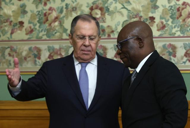 Russian Foreign Minister Sergei Lavrov and Minister of Foreign Affairs and International Cooperation of Equatorial Guinea Simeon Oyono Esono Angue hold a joint press conference following their talks in Moscow on May 18, 2026. (Photo by MAXIM SHIPENKOV / POOL / AFP)