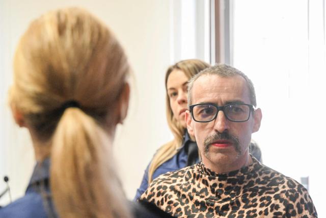 Marla-Svenja Liebich (R), a convicted German far-right extremist and neo-Nazi formerly known as Sven is escorted by Czech prison service to the Regional court on May 18, 2026 in Pilsen, Czech Republic, where Leibich will wait for court decision to decide on extradition to Germany. (Photo by Michal Cizek / AFP)