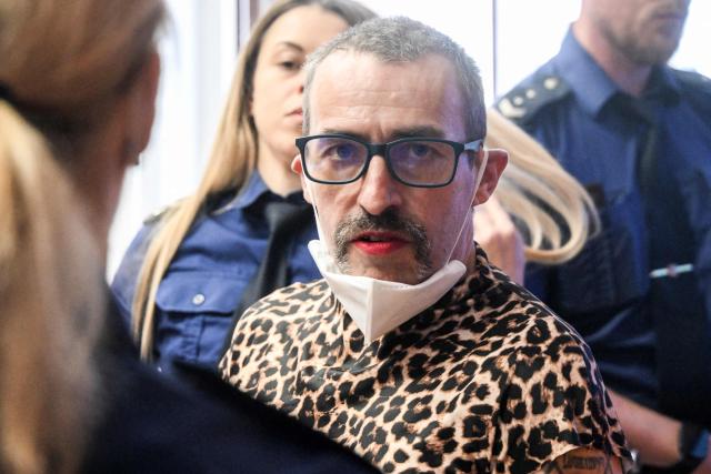 Marla-Svenja Liebich (C), a convicted German far-right extremist and neo-Nazi formerly known as Sven is escorted by Czech prison service to the Regional court on May 18, 2026 in Pilsen, Czech Republic, where Leibich will wait for court decision to decide on extradition to Germany. (Photo by Michal Cizek / AFP)