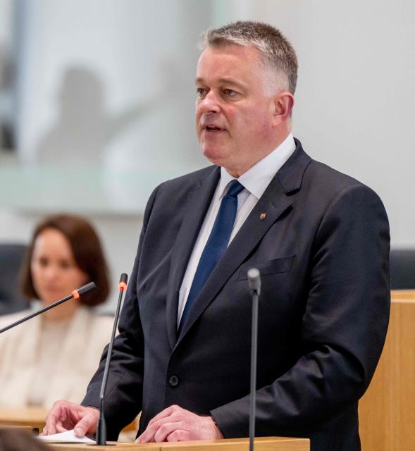 The new State Premier of Rhineland-Palatinate, member of the conservative Christian Democratic Union (CDU) party, Gordon Schnieder (R), delivers his first speech at the State Parliament on May 18, 2026 in Mainz, western Germany. The Constituent session of the new state parliament with the election of the Minister-President of Rhineland-Palatinate follows the state elections of March 22, 2026. (Photo by Torsten Silz / AFP)