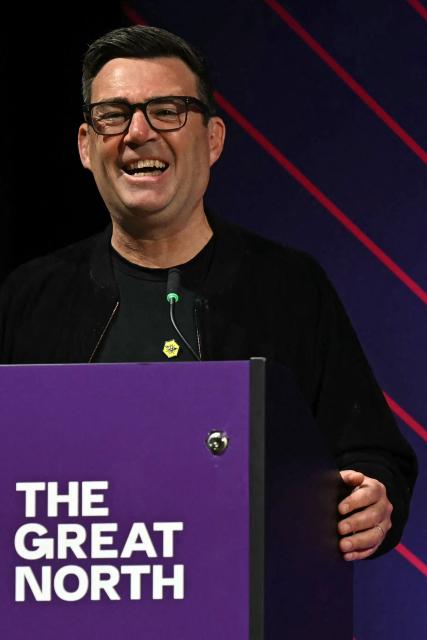 Greater Manchester mayor Andy Burnham smiles as he speaks at The Great North Investment Summit, in Leeds, northern England on May 18, 2026. If selected to run in the Makerfield by-election, expected in mid-June at the earliest, Burnham would face a tough fight from the poll-topping Reform UK. (Photo by Paul ELLIS / AFP)