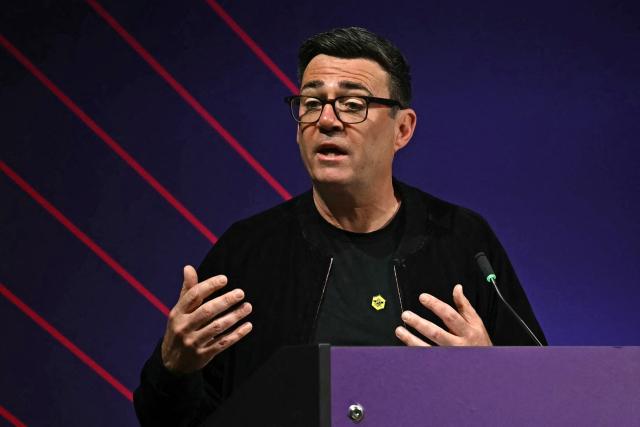 Greater Manchester mayor Andy Burnham gestures as he speaks at The Great North Investment Summit, in Leeds, northern England on May 18, 2026. If selected to run in the Makerfield by-election, expected in mid-June at the earliest, Burnham would face a tough fight from the poll-topping Reform UK. (Photo by Paul ELLIS / AFP)
