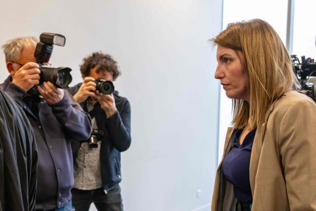 Defendant Laetitia R. arrives for the trial of Guillaume B., who is accused of multiple acts of abuse against his partner over seven years from 2015 to 2020, at the Alpes-de-Haute-Provence court in Digne-les-Bains, southeastern France, on May 18, 2026. The trial of Guillaume B., accused of subjecting his partner to seven years of abuse and rape accompanied by acts of torture, began on May 18, 2026 at the Assize Court in Digne-les-Bains (Alpes-de-Haute-Provence), where he faces a life sentence. (Photo by MIGUEL MEDINA / AFP)
