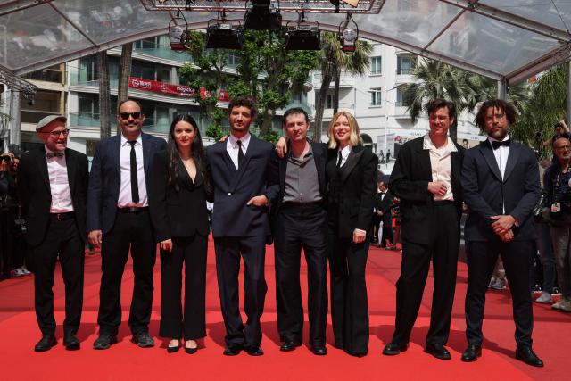 (From L) French screenwriter Vincent Poymiro, French producer Nicolas Anthome, Austrian actress Lilith Grasmug, French-Canadian actor Niels Schneider, French director and screenwriter Arthur Harari, French actress Lea Seydoux, French screenwriter Lucas Harari and French film editor Laurent Senechal arrive for the screening of the film "L'Inconnue" (The Unknown) at the 79th edition of the Cannes Film Festival in Cannes, southern France on May 18, 2026. (Photo by Valery HACHE / AFP)