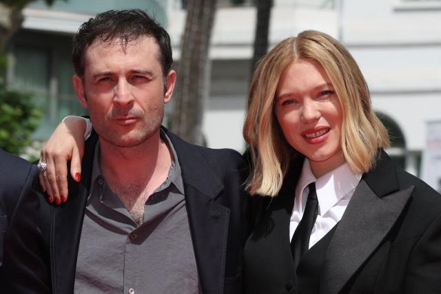 French director and screenwriter Arthur Harari (L) and French actress Lea Seydoux arrive for the screening of the film "L'Inconnue" (The Unknown) at the 79th edition of the Cannes Film Festival in Cannes, southern France on May 18, 2026. (Photo by Valery HACHE / AFP)