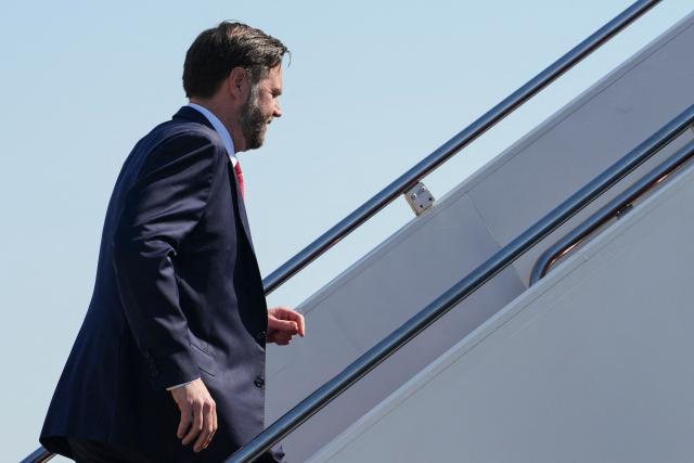 US Vice President JD Vance boards Air Force Two en route to Kansas City, Missouri, at Joint Base Andrews, Maryland on May 18, 2026. (Photo by Eric Lee / AFP)