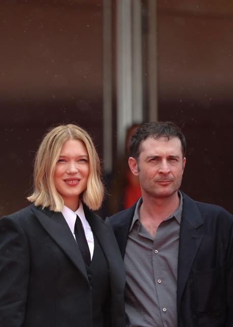 French actress Lea Seydoux and French director and screenwriter Arthur Harari arrive for the screening of the film "L'Inconnue" (The Unknown) at the 79th edition of the Cannes Film Festival in Cannes, southern France on May 18, 2026. (Photo by Valery HACHE / AFP)