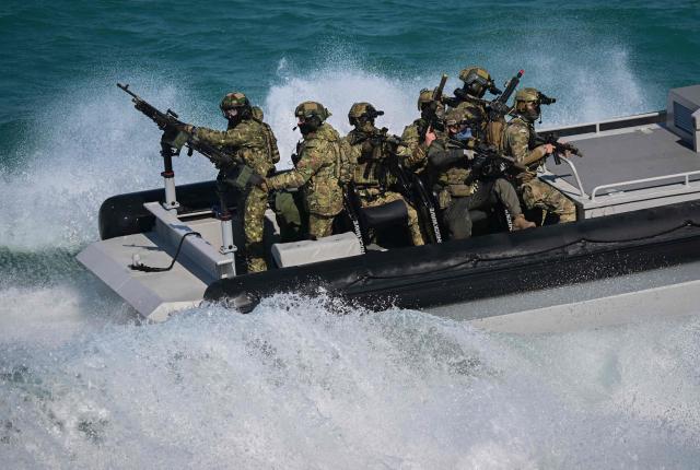 Officers of the NATO Special Operations Forces are seen during the Trojan Footprint 2026 (TFP26) military exercise at sea in Constanta, south-eastern Romania, on May 18, 2026. TFP26 is the largest U.S. Special Operations Forces (SOF) led exercise in Europe, bringing together approximately 1,000 U.S. service members and 2,000 SOF personnel from 23 NATO Allies and partner nations. Running through mid-May, the exercise spans multiple Eastern European countries including Greece and Georgia where it encompasses the "Black Sea Gateway 2026" land and maritime operations. (Photo by Daniel MIHAILESCU / AFP)