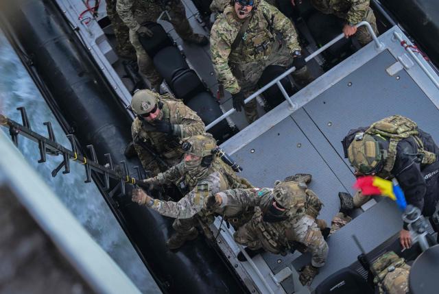 Officers of the NATO Special Operations Forces are seen during the Trojan Footprint 2026 (TFP26) military exercise at sea in Constanta, south-eastern Romania, on May 18, 2026. TFP26 is the largest U.S. Special Operations Forces (SOF) led exercise in Europe, bringing together approximately 1,000 U.S. service members and 2,000 SOF personnel from 23 NATO Allies and partner nations. Running through mid-May, the exercise spans multiple Eastern European countries including Greece and Georgia where it encompasses the "Black Sea Gateway 2026" land and maritime operations. (Photo by Daniel MIHAILESCU / AFP)