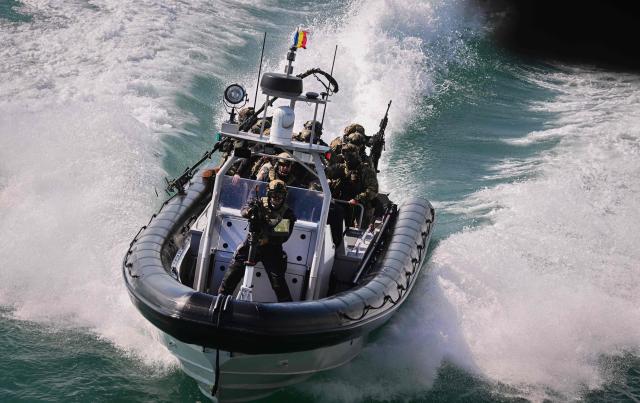 Officers of the NATO Special Operations Forces are seen during the Trojan Footprint 2026 (TFP26) military exercise at sea in Constanta, south-eastern Romania, on May 18, 2026. TFP26 is the largest U.S. Special Operations Forces (SOF) led exercise in Europe, bringing together approximately 1,000 U.S. service members and 2,000 SOF personnel from 23 NATO Allies and partner nations. Running through mid-May, the exercise spans multiple Eastern European countries including Greece and Georgia where it encompasses the "Black Sea Gateway 2026" land and maritime operations. (Photo by Daniel MIHAILESCU / AFP)