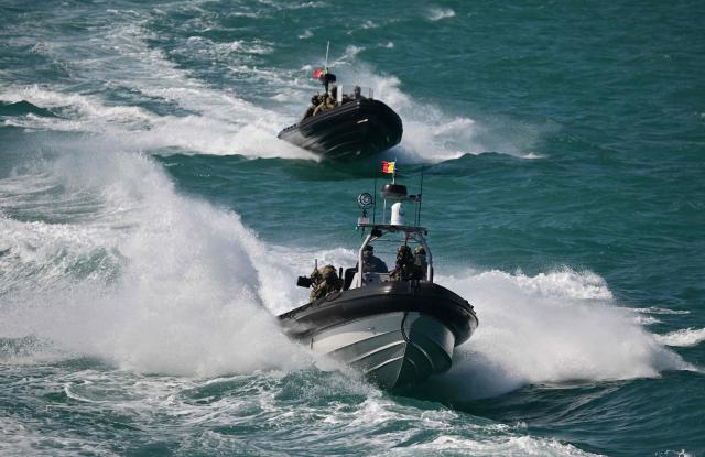 Officers of the NATO Special Operations Forces are seen during the Trojan Footprint 2026 (TFP26) military exercise at sea in Constanta, south-eastern Romania, on May 18, 2026. TFP26 is the largest U.S. Special Operations Forces (SOF) led exercise in Europe, bringing together approximately 1,000 U.S. service members and 2,000 SOF personnel from 23 NATO Allies and partner nations. Running through mid-May, the exercise spans multiple Eastern European countries including Greece and Georgia where it encompasses the "Black Sea Gateway 2026" land and maritime operations. (Photo by Daniel MIHAILESCU / AFP)