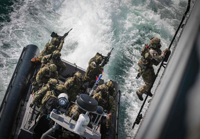 Officers of the NATO Special Operations Forces are seen during the Trojan Footprint 2026 (TFP26) military exercise at sea in Constanta, south-eastern Romania, on May 18, 2026. TFP26 is the largest U.S. Special Operations Forces (SOF) led exercise in Europe, bringing together approximately 1,000 U.S. service members and 2,000 SOF personnel from 23 NATO Allies and partner nations. Running through mid-May, the exercise spans multiple Eastern European countries including Greece and Georgia where it encompasses the "Black Sea Gateway 2026" land and maritime operations. (Photo by Daniel MIHAILESCU / AFP)