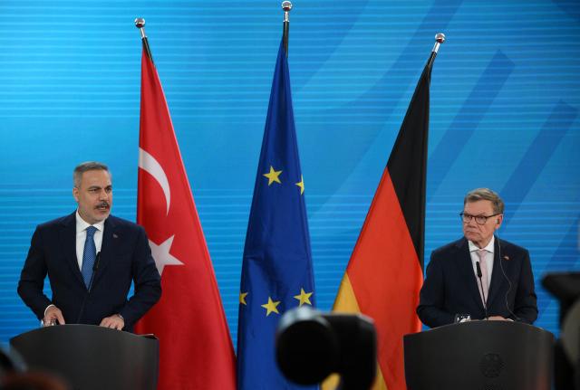 German Foreign Minister Johann Wadephul (R) and his Turkish counterpart Hakan Fidan deliver a joint press conference following talks at the Foreign Office in Berlin on May 18, 2026. (Photo by RALF HIRSCHBERGER / AFP)