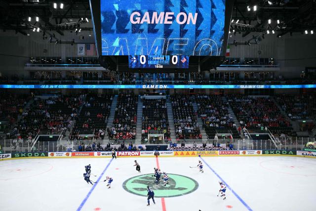 A general view shows the rink and tribunes at the start of the IIHF Ice Hockey Men's World Championship first round group A match between Finland and USA at the Swiss Life Arena in Zurich on May 18, 2026. (Photo by SEBASTIEN BOZON / AFP)