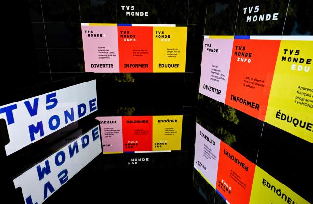 This illustration photograph shows screens displaying the logo of the international French television channel TV5Monde in Toulouse, south-western France, on May 18, 2026. (Photo by Lionel BONAVENTURE / AFP)