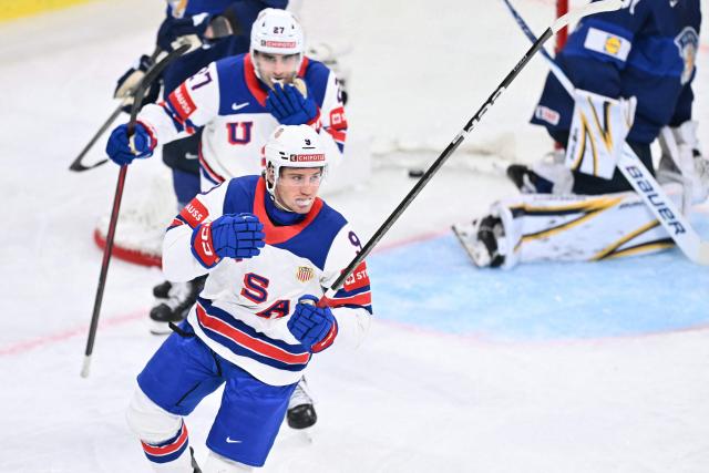 USA's forward #09 Ryan Leonard  celebrates  after scoring his team's second goal during the IIHF Ice Hockey Men's World Championship first round group A match between Finland and USA at the Swiss Life Arena in Zurich on May 18, 2026. (Photo by SEBASTIEN BOZON / AFP)