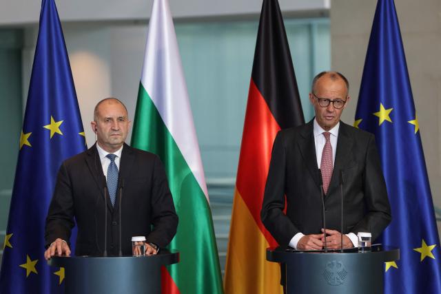 German Chancellor Friedrich Merz (R) and Bulgaria's Prime Minister Roman Radev address a press conference after talks at the Chancellery in Berlin on May 18, 2026. (Photo by Odd ANDERSEN / AFP)