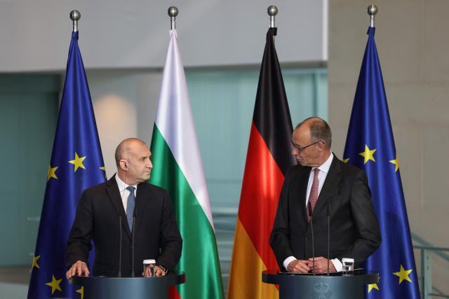German Chancellor Friedrich Merz (R) and Bulgaria's Prime Minister Roman Radev address a press conference after talks at the Chancellery in Berlin on May 18, 2026. (Photo by Odd ANDERSEN / AFP)