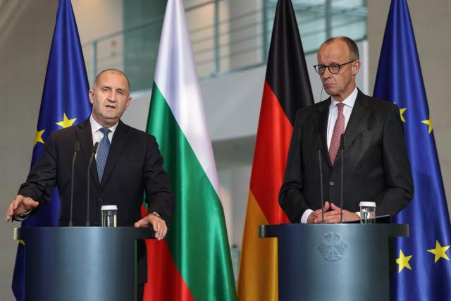 German Chancellor Friedrich Merz (R) and Bulgaria's Prime Minister Roman Radev address a press conference after talks at the Chancellery in Berlin on May 18, 2026. (Photo by Odd ANDERSEN / AFP)