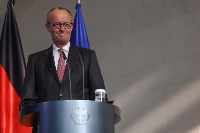 German Chancellor Friedrich Merz addresses a press conference after talks with his Bulgarian counterpart at the Chancellery in Berlin on May 18, 2026. (Photo by Odd ANDERSEN / AFP)