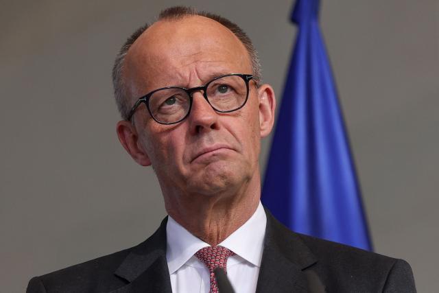 German Chancellor Friedrich Merz addresses a press conference after talks with his Bulgarian counterpart at the Chancellery in Berlin on May 18, 2026. (Photo by Odd ANDERSEN / AFP)