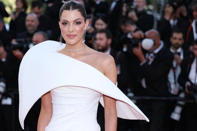 French model Iris Mittenaere arrives for the screening of the film "Fjord" at the 79th edition of the Cannes Film Festival in Cannes, southern France on May 18, 2026. (Photo by Sameer AL-DOUMY / AFP)