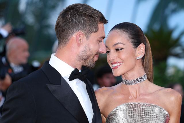 Paris FC's German goalkeeper Kevin Trapp and Brazilian model Izabel Goulart arrive for the screening of the film "Fjord" at the 79th edition of the Cannes Film Festival in Cannes, southern France on May 18, 2026. (Photo by Sameer AL-DOUMY / AFP)